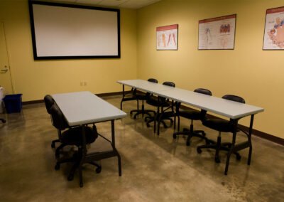 24" x 60" Wishbone Leg Alulite Tables in a classroom setup
